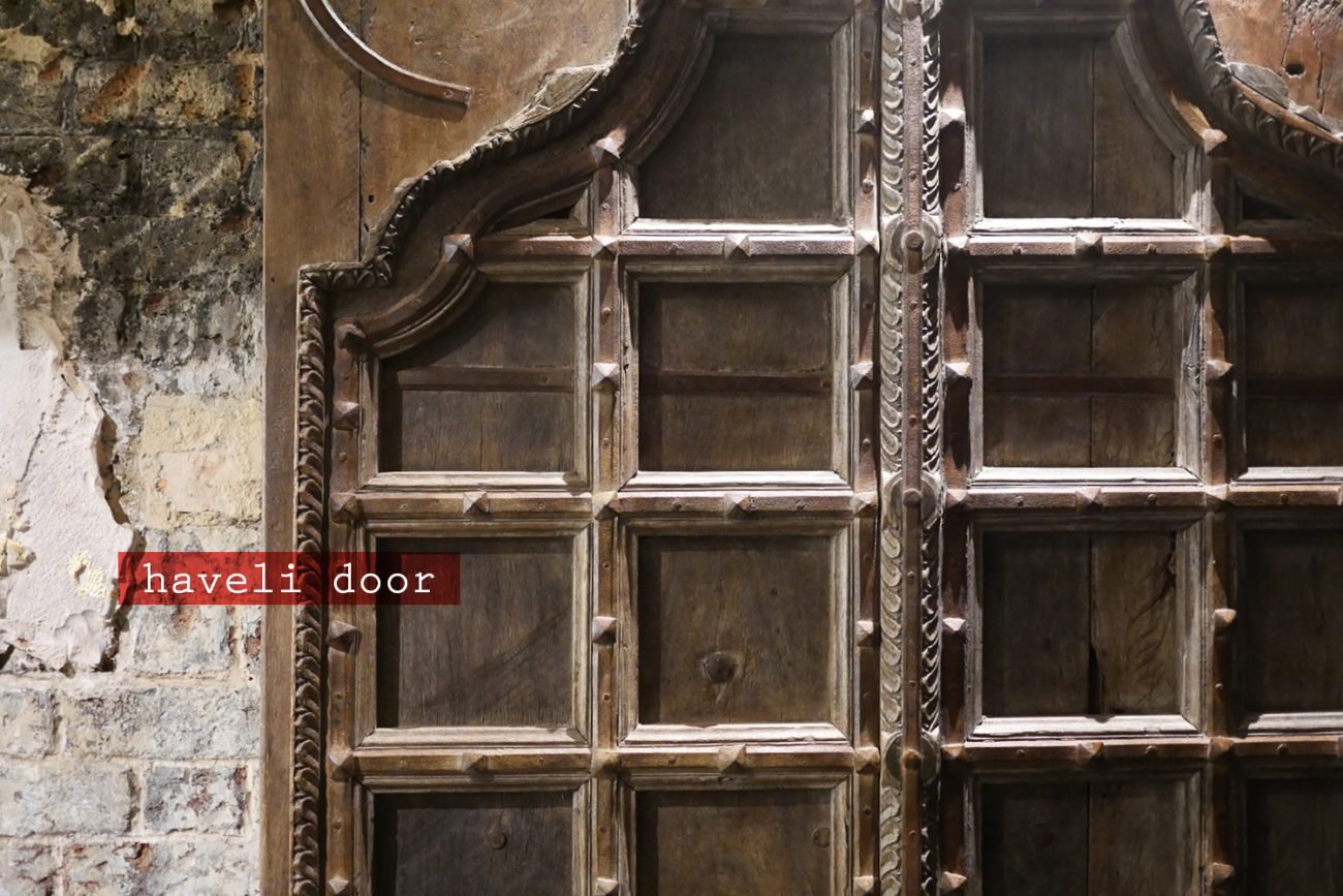 kricket-soho-london-bar-restaurant-design-interiors-haveli-door-indian caption